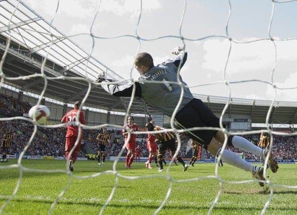 HULL, ENGLAND - Saturday, April 25, 2009: Hull City's goalkeeper Boaz Myhill is beaten by Liverpool's Xabi Alonso for the opening goal during the Premiership match at the KC Stadium. (Photo by David Rawcliffe/Propaganda)