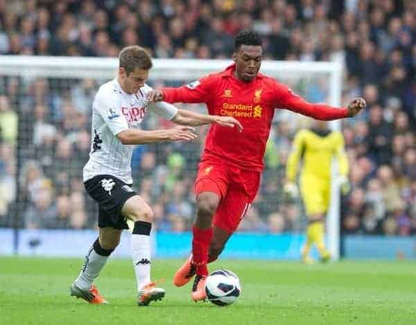LONDON, ENGLAND - Sunday, May 12, 2013: Liverpool's Daniel Sturridge in action against Fulham's Alex Kacaniklic during the Premiership match at Craven Cottage. (Pic by David Rawcliffe/Propaganda)