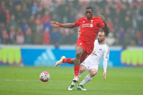 SWANSEA, WALES - Sunday, May 1, 2016: Liverpool's Sheyi Ojo in action against Swansea City's Leon Britton during the Premier League match at the Liberty Stadium. (Pic by David Rawcliffe/Propaganda)