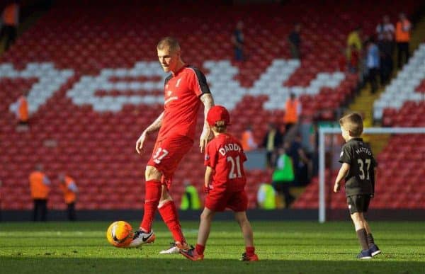 LIVERPOOL, ENGLAND - Sunday, May 8, 2016: Liverpool's Martin Skrtel plays with his children on pitch after the 2-0 victory over Watford during the Premier League match at Anfield. (Pic by David Rawcliffe/Propaganda)