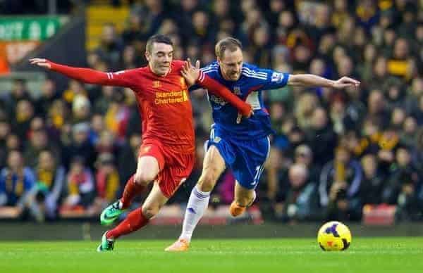 LIVERPOOL, ENGLAND - Wednesday, January 1, 2014: Liverpool's Iago Aspas in action against Hull City's David Meyler during the Premiership match at Anfield. (Pic by David Rawcliffe/Propaganda)