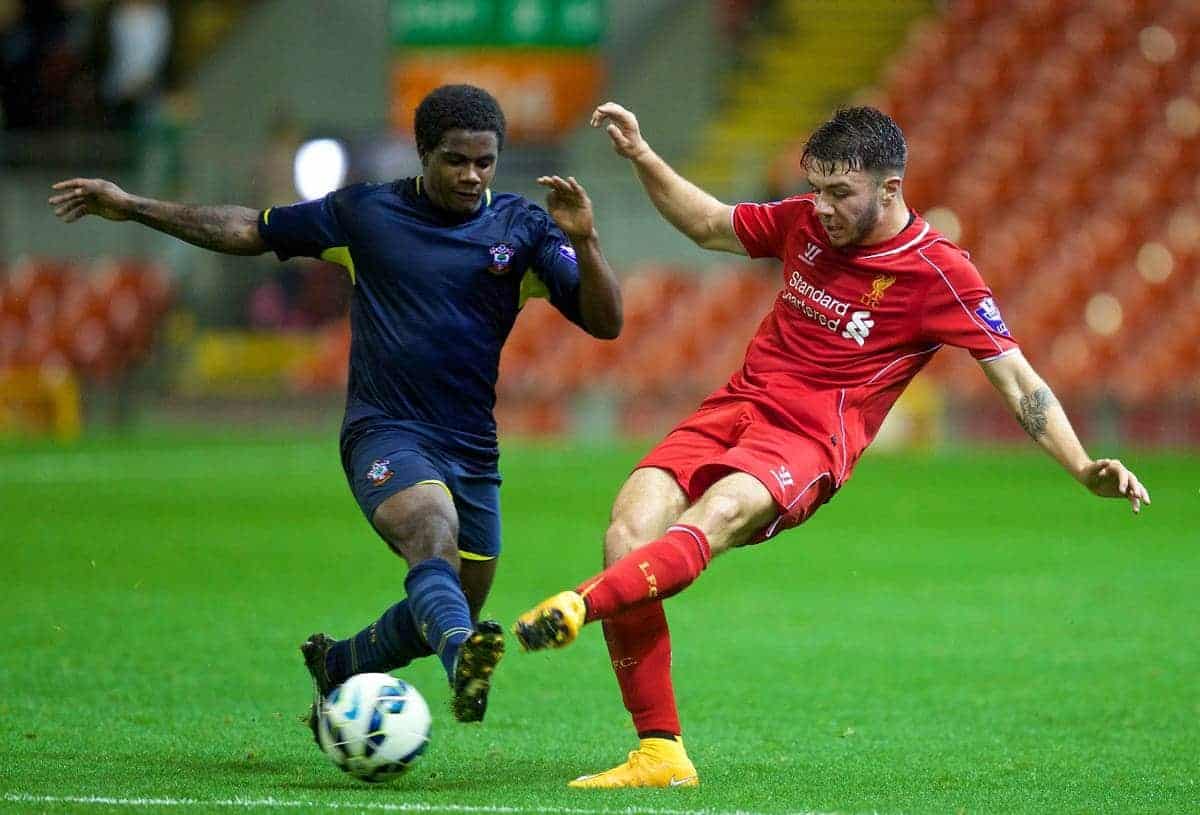 ANFIELD, ENGLAND - Thursday, October 16, 2014: Liverpool's Joe Maguire in action against Southampton's Omar Rowe during the Under 21 FA Premier League match at Anfield. (Pic by David Rawcliffe/Propaganda)