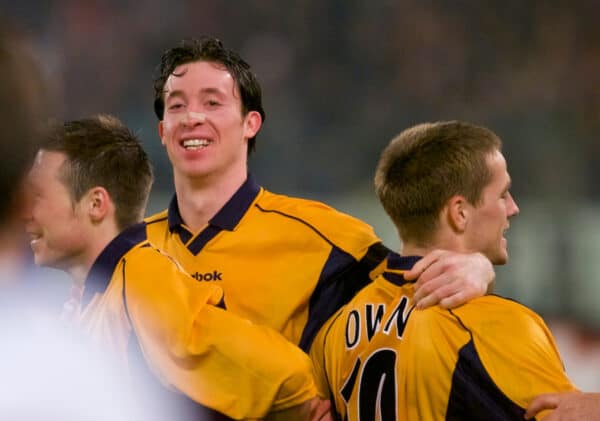 ROME, ITALY - Thursday, February 15, 2001: Liverpool's two-goal hero Michael Owen celebrates his first goal against AS Roma with team-mate Robbie Fowler during the UEFA Cup 4th Round 1st Leg match at the Stadio Olimpico. (Pic by David Rawcliffe/Propaganda)