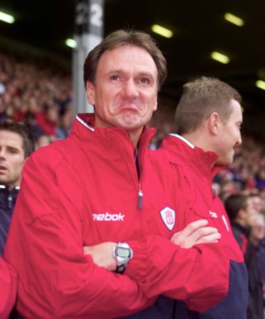 LIVERPOOL, ENGLAND - Sunday, November 4, 2001: Liverpool's caretaker manager Phil Thompson admires the Kop's tribute to manager Gerard Houllier during the Premiership match at Anfield. (Pic by David Rawcliffe/Propaganda)