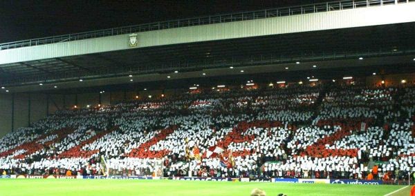 LIVERPOOL, ENGLAND - Tuesday, March 19, 2002: Liverpool fans on the Spion Kop spell out Allez before the UEFA Champions League Group B match against AS Roma match at Anfield. (Pic by David Rawcliffe/Propaganda)