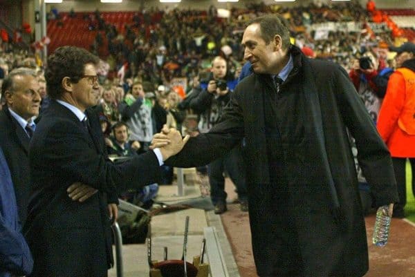 LIVERPOOL, ENGLAND - Tuesday, March 19, 2002: Liverpool's manager Gerard Houllier is embraced by AS Roma manager Fabio Capello as he returns to the touchline after recovering from a heart attack, during the UEFA Champions League Group B match against AS Roma at Anfield. (Pic by David Rawcliffe/Propaganda)