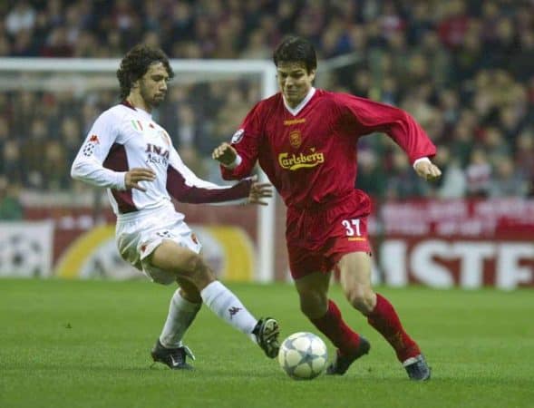 LIVERPOOL, ENGLAND - Tuesday, March 19, 2002: Liverpool's Jari Litmanen and AS Roma's Damiano Tommasi during the UEFA Champions League Group B match at Anfield. (Pic by David Rawcliffe/Propaganda)