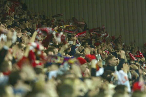 LIVERPOOL, ENGLAND - Tuesday, March 19, 2002: Liverpool's fans standing on the Spion Kop during the UEFA Champions League match against AS Roma at Anfield. (Pic by David Rawcliffe/Propaganda)