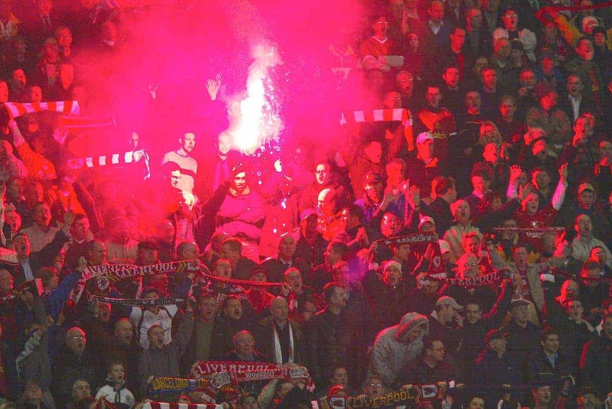 LIVERPOOL, ENGLAND - Tuesday, March 19, 2002: Liverpool's fans set off a flare on the Kop during the UEFA Champions League match against AS Roma at Anfield. (Pic by David Rawcliffe/Propaganda)
