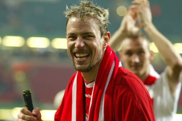 CARDIFF, WALES - Sunday, March 2, 2003: Liverpool's Stephane Henchoz celebrates victory over Manchester United with a bottle of champagne during the Football League Cup Final at the Millennium Stadium.  (Photo by David Rawcliffe/Propaganda)