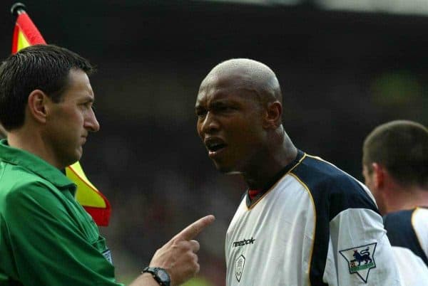 MANCHESTER, ENGLAND - Saturday, April 5, 2003: Liverpool's El-Hadji Diouf argues with a biased linesman against Manchester United during the Premiership match at Old Trafford. (Pic by David Rawcliffe/Propaganda)