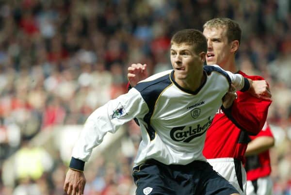 MANCHESTER, ENGLAND - Saturday, April 5, 2003: Liverpool's Stephen Gerrard and Manchester United's Phil Neville during the Premiership match at Old Trafford. (Pic by David Rawcliffe/Propaganda)