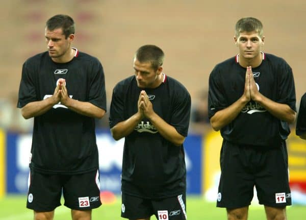 BANGKOK, THAILAND - Wednesday, July 23, 2003: Liverpool's Jamie Carragher (l), Michael Owen (c) and Steven Gerrard (r) bow to the Thai fans before training session in Bangkok, Thailand. (Pic by David Rawcliffe/Propaganda)