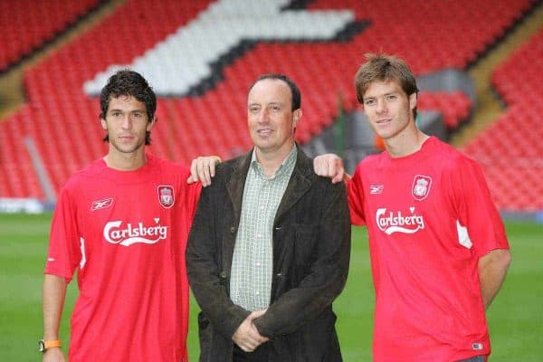 LIVERPOOL, ENGLAND - WEDNESDAY AUGUST 25th 2004: Liverpool's manager Rafael Benitez poses with his two new Spanish signings Luis Garcia (l) and Xabi Alonso (r) at Anfield. (Photo by David Rawcliffe/Propaganda)