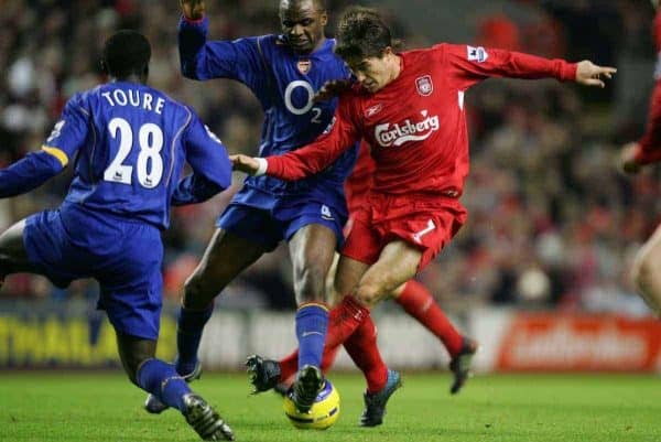 LIVERPOOL, ENGLAND- SUNDAY NOVEMBER 28th 2004: Liverpool's Harry Kewell tackled by Arsenal's Patrick Vieira and Kolo Toure during the Premiership match at Anfield. (Pic by David Rawcliffe/Proparganda)