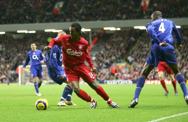 LIVERPOOL, ENGLAND- SUNDAY NOVEMBER 28th 2004: Liverpool's Florent Sinama-Pongolle and Arsenal's Fredrik Ljungberg and Patrick Vieira during the Premiership match at Anfield. (Pic by David Rawcliffe/Proparganda)