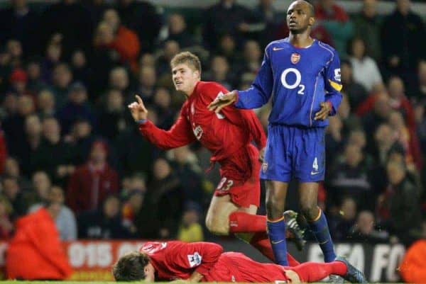 LIVERPOOL, ENGLAND- SUNDAY NOVEMBER 28th 2004: Liverpool's Neil Mellor celebrates scoring the winning goal in injury time as Arsenal's Patrick Vieira looks on dejected during the Premiership match at Anfield. (Pic by David Rawcliffe/Proparganda)