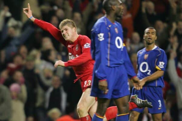 LIVERPOOL, ENGLAND- SUNDAY NOVEMBER 28th 2004: Liverpool's Neil Mellor celebrates scoring the winning goal in injury time as Arsenal's Sol Campbell looks on dejected during the Premiership match at Anfield. (Pic by David Rawcliffe/Proparganda)