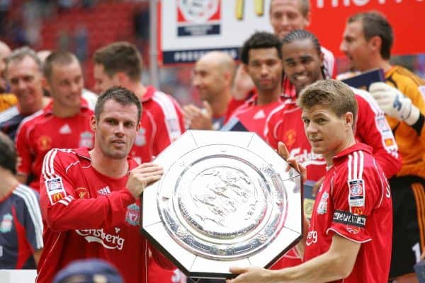 CARDIFF, WALES - SUNDAY, AUGUST 13th, 2006: Liverpool's Jamie Carragher and Steven Gerrard lift up the trophy after the Community Shield match against Chelsea at the Millennium Stadium. (Pic by David Rawcliffe/Propaganda)