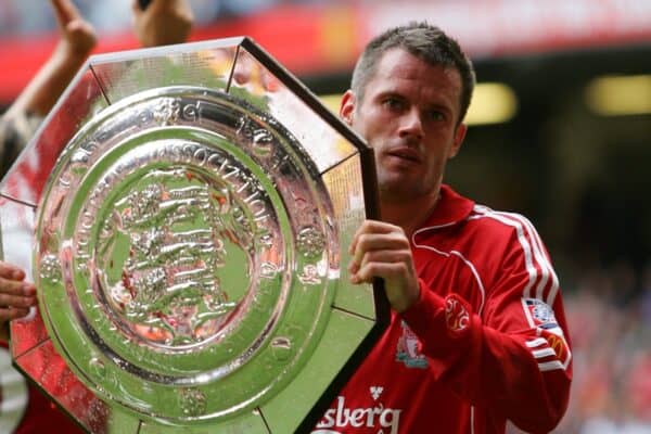 CARDIFF, WALES - SUNDAY, AUGUST 13th, 2006: Liverpool's Jamie Carragher lifts up the trophy after beating 2-1 Chelsea in the Community Shield match at the Millennium Stadium. (Pic by David Rawcliffe/Propaganda)