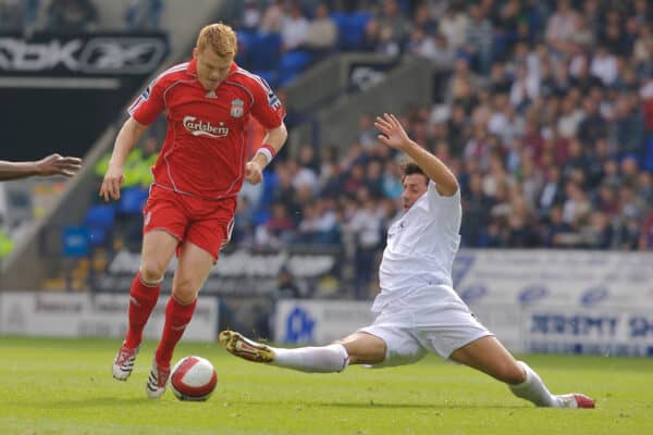 BOLTON, ENGLAND - SATURDAY, SEPTEMBER 30th , 2006: Liverpool's John Arne Riise is tackled by Bolton Wanderers' Ivan Campo during the Premiership match at the Reebok Stadium. (Pic by David Rawcliffe/Propaganda)