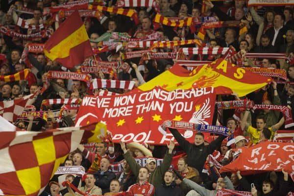 Liverpool, England - Tuesday, March 6, 2007: Liverpool fans sing 'You'll Never Walk Alone' and wave flags and scarves on the famous Spion Kop during the UEFA Champions League First Knockout Round 2nd Leg against FC Barcelona at Anfield. (Pic by David Rawcliffe/Propaganda)