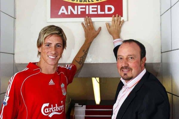 Liverpool, England - Wednesday, July 4, 2007: Liverpool's new signing Fernando Torres with manage Rafael Benitez under the famous This is Anfield sign following his £26m transfer from Atletico Madird, a club record transfer fee. (Photo by David Rawcliffe/Propaganda)