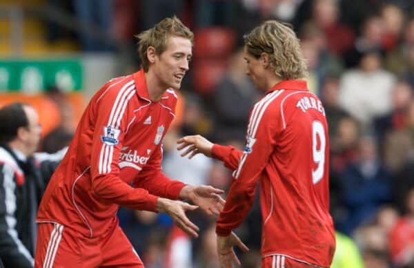 LIVERPOOL, ENGLAND - Saturday, February 23, 2008: Liverpool's Fernando Torres is substituted for Peter Crouch following his hat-trick of goals against Middlesbrough during the Premiership match at Anfield. (Photo by David Rawcliffe/Propaganda)