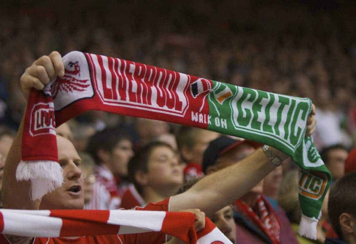 LIVERPOOL, ENGLAND - Sunday, May 4, 2008: A Liverpool fan holds up a scarf with Liverpool and Glasgow Celtic on during the Premiership match at Anfield. (Photo by David Rawcliffe/Propaganda)