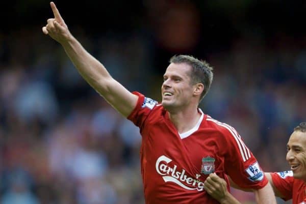 LIVERPOOL, ENGLAND - Saturday, August 23, 2008: Liverpool's Jamie Carragher celebrates scoring the equaliser against Middlesbrough with team-mate Nabil El Zhar during the Premiership match at Anfield. (Photo by David Rawcliffe/Propaganda)