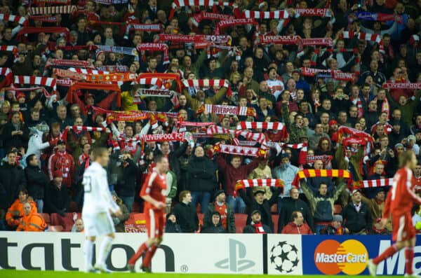 LIVERPOOL, ENGLAND - Tuesday, March 10, 2009: Liverpool supporters sing their anthem 'You'll Never Walk Alone' as the Reds beat Real Madrid 4-0 during the UEFA Champions League First Knockout Round 2nd Leg match at Anfield. (Photo by David Rawcliffe/Propaganda)