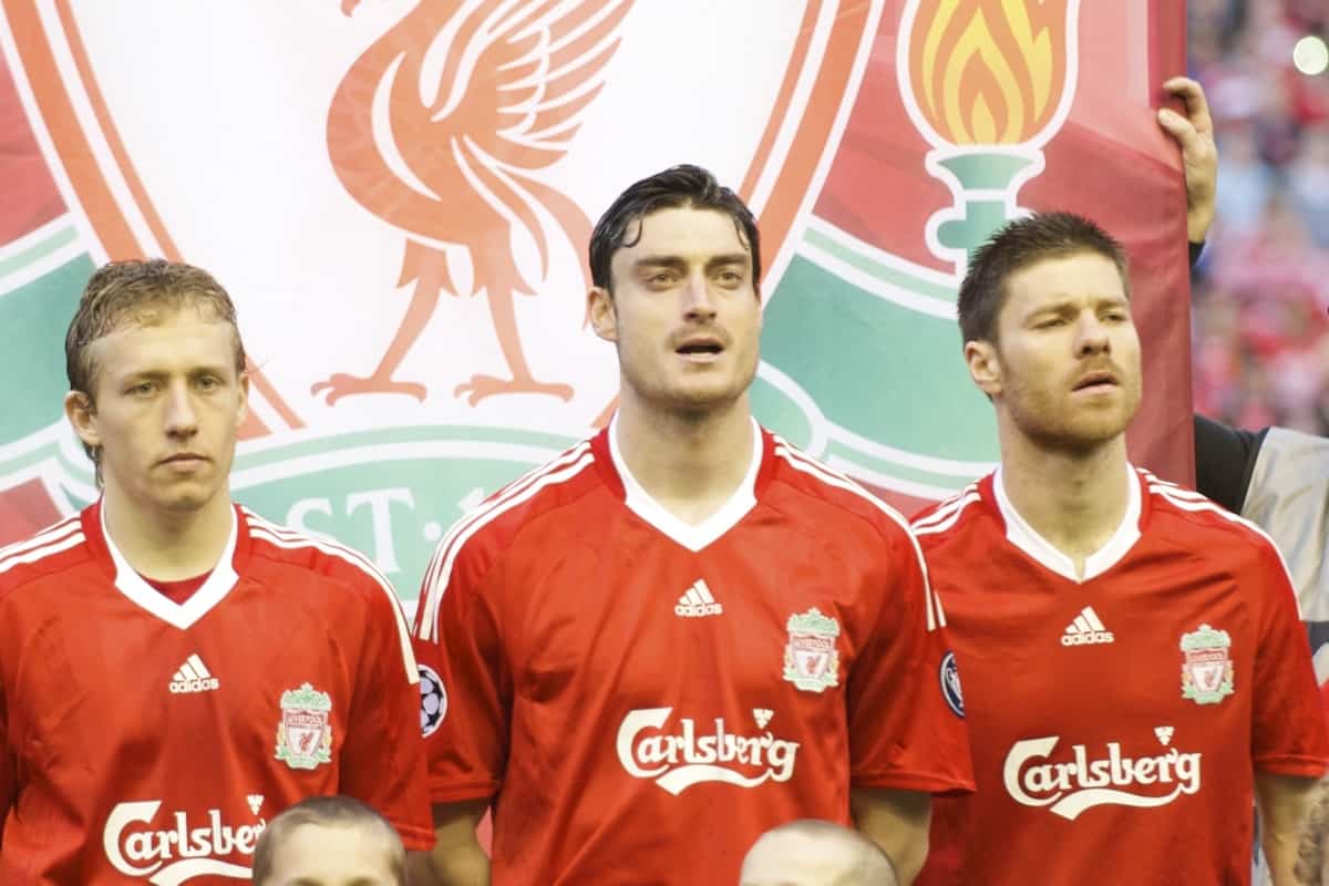 LIVERPOOL, ENGLAND - Wednesday, April 8, 2009: Liverpool's Lucas Leiva, Albert Riera and Xabi Alonso with mascots before the UEFA Champions League Quarter-Final 1st Leg match against Chelsea at Anfield. (Photo by David Rawcliffe/Propaganda)