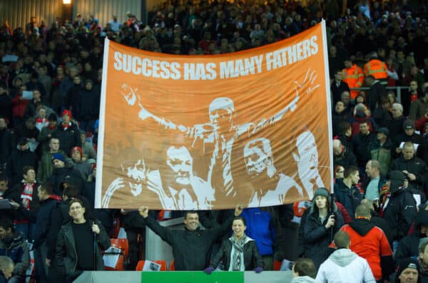 LIVERPOOL, ENGLAND - Wednesday, December 16, 2009: Liverpool's supporters on the Spion Kop display a banner reading "Success Has Many Fathers", accompanied by images of legendary Liverpool managers Kenny Dalglish, Bob Paisley, Bill Shankly, Joe Fagan and current manager Rafael Benitez during the Premiership match against Wigan Athletic at Anfield. (Photo by: David Rawcliffe/Propaganda)