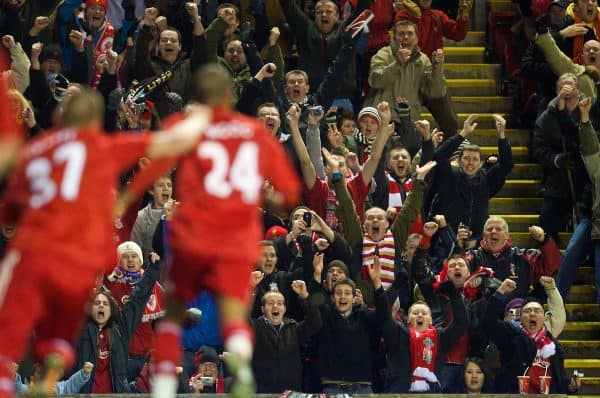 LIVERPOOL, ENGLAND - Wednesday, December 16, 2009: Liverpool supporters celebrate after David Ngog scores the opening goal against Wigan Athletic during the Premiership match at Anfield. (Photo by: David Rawcliffe/Propaganda)