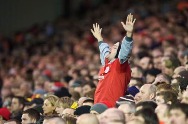 LIVERPOOL, ENGLAND - Saturday, December 26, 2009: A Liverpool supporter on the Spion Kop during the Premiership match against Wolverhampton Wanderers at Anfield. (Photo by: David Rawcliffe/Propaganda)