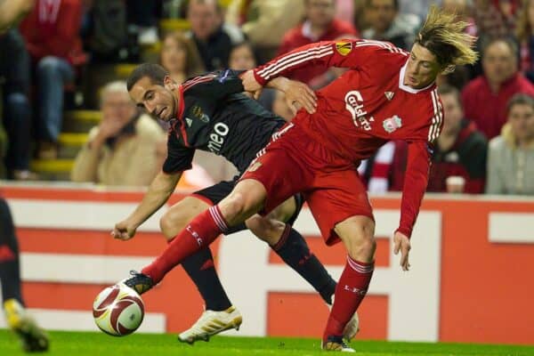 LIVERPOOL, ENGLAND - Thursday, April 8, 2010: Liverpool's Fernando Torres and Sport Lisboa e Benfica's Ruben Amorim during the UEFA Europa League Quarter-Final 2nd Leg match at Anfield. (Photo by: David Rawcliffe/Propaganda)