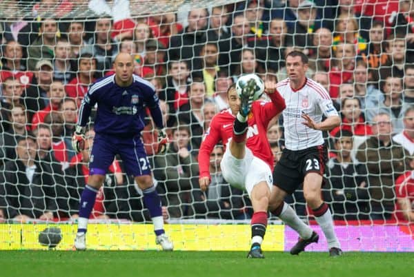 MANCHESTER, ENGLAND - Sunday, September 19, 2010: Manchester United's Dimitar Berbatov scores his side's second goal against Liverpool during the Premiership match at Old Trafford. (Photo by David Rawcliffe/Propaganda)