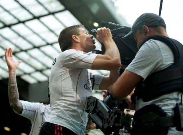 MANCHESTER, ENGLAND - Sunday, September 19, 2010: Liverpool's captain Steven Gerrard MBE celebrates scoring his, and side's, second goal against Manchester United by kissing the television steady cam during the Premiership match at Old Trafford. (Photo by David Rawcliffe/Propaganda)