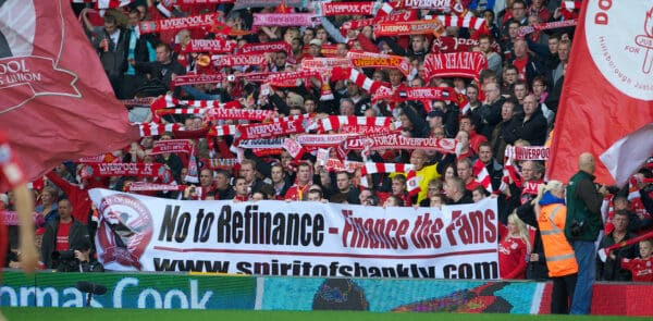 LIVERPOOL, ENGLAND - Sunday, October 3, 2010: Liverpool's supporters on the Spion Kop display a banner urging the Royal Bank of Scotland to reject a refinancing deal for the loan of club co-owners Tom Hicks and George Gillett before the Premiership match against Blackpool at Anfield. (Photo by David Rawcliffe/Propaganda)