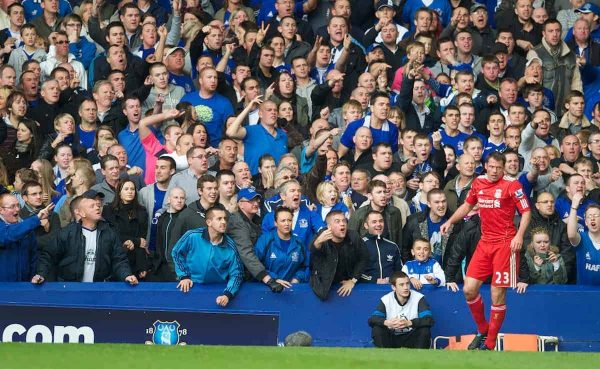 LIVERPOOL, ENGLAND - Sunday, October 17, 2010: Liverpool's Jamie Carragher is abused by Everton supporters during the 214th Merseyside Derby match at Goodison Park. (Photo by David Rawcliffe/Propaganda)