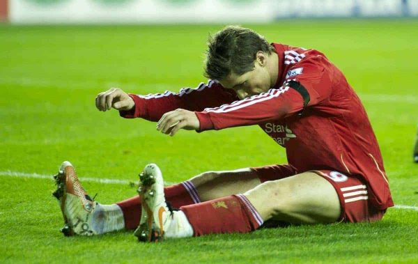 WIGAN, ENGLAND - Wednesday, November 10, 2010: Liverpool's Fernando Torres rues a missed chance against Wigan Athletic during the Premiership match at the DW Stadium. (Photo by David Rawcliffe/Propaganda)