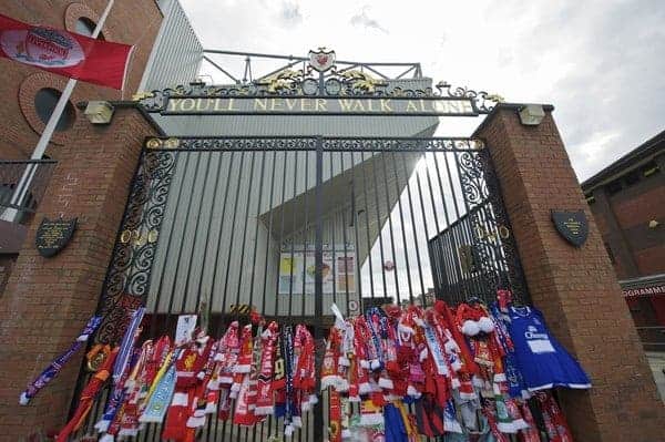 LIVERPOOL, ENGLAND - Friday, April 15, 2011: Scarves and floral tributes left at the Shankly Gates at the Memorial Service to remember the 96 victims of the Hillsborough Stadium Disaster in 1989. (Photo by David Rawcliffe/Propaganda)