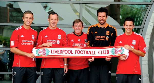 LIVERPOOL, ENGLAND - Wednesday, August 3, 2011: Liverpool's manager Kenny Dalglish with his latest signings (left to right) Jordan Henderson, Charlie Adam, goalkeeper Alexander Doni and Stewart Downing as they pose for photographers following a press conference at the club's Melwood Training Ground. (Pic by Propaganda)