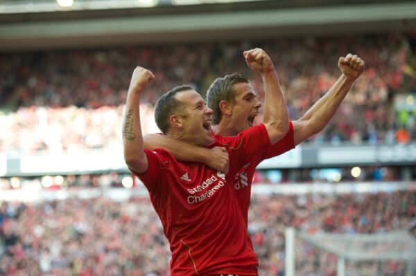LIVERPOOL, ENGLAND - Saturday, August 27, 2011: Liverpool's Charlie Adam celebrates scoring the third goal against Bolton Wanderers with team-mate Jordan Henderson during the Premiership match at Anfield. (Pic by David Rawcliffe/Propaganda)
