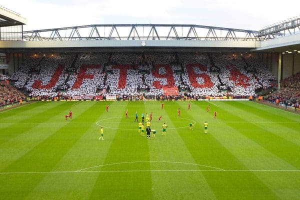 LIVERPOOL, ENGLAND - Saturday, October 22, 2011: Liverpool supporters on the famous Spion Kop hold up a mosaic reading JFT96 calling for Justice for the 96 before the Premiership match against Norwich City at Anfield. The fans are backing a campaign for the families of the 96 victims of the Hillsborough Stadium Disaster in 1989 who have waited over 22 years for Justice. (Pic by Vegard Grott/Propaganda)