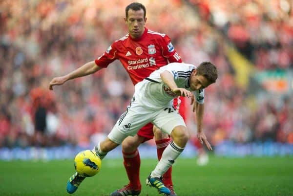 LIVERPOOL, ENGLAND - Saturday, November 5, 2011: Liverpool's Charlie Adam in action against Swansea City's Joe Allen during the Premiership match at Anfield. (Pic by David Rawcliffe/Propaganda)