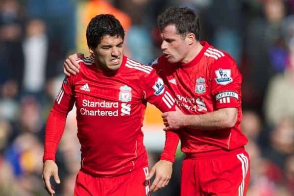 LIVERPOOL, ENGLAND - Saturday, March 3, 2012: Liverpool's Luis Alberto Suarez Diaz and Jamie Carragher against Arsenal during the Premiership match at Anfield. (Pic by David Rawcliffe/Propaganda)