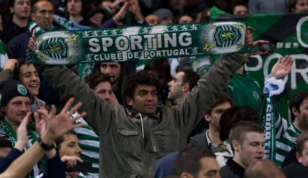 MANCHESTER, ENGLAND - Thursday, March 15, 2012: Sporting Clube de Portugal fans celebrate their side's victory over Manchester City during the UEFA Europa League Round of 16 2nd Leg match at City of Manchester Stadium. (Pic by Vegard Grott/Propaganda)