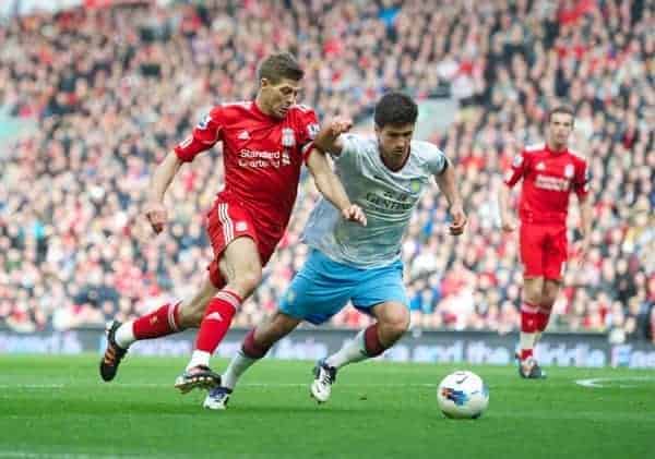 LIVERPOOL, ENGLAND - Saturday, April 7, 2012: Liverpool's captain Steven Gerrard in action against Aston Villa's Eric Lichaj during the Premiership match at Anfield. (Pic by David Rawcliffe/Propaganda)