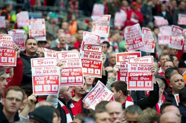 LONDON, ENGLAND - Saturday, April 14, 2012: Liverpool supporters with 'Don't Buy The Sun' posters during the FA Cup Semi-Final match against Everton at Wembley. (Pic by David Rawcliffe/Propaganda)